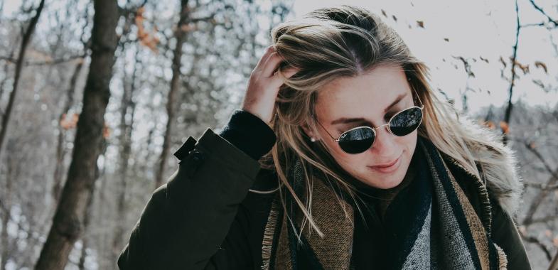 Woman in sunglasses in winter