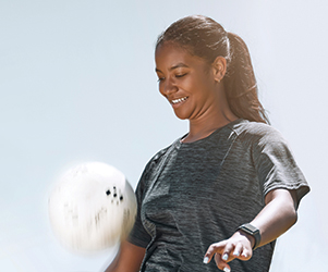 Woman with soccer ball